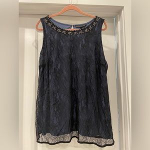 Black lace over blue blouse with embellishments
